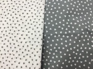 Corazones gris y blanco